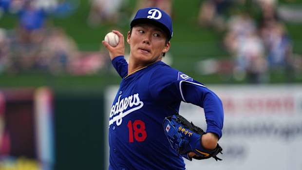 Los Angeles Dodgers starting pitcher Yoshinobu Yamamoto threw two scoreless innings in his Cactus League debut against the Texas Rangers on Wednesday at Surprise Stadium.